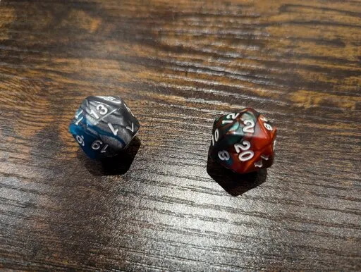 DnD innovation dice roll showing a 13 and a 2